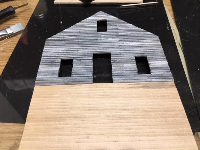 gable wall sided and stained