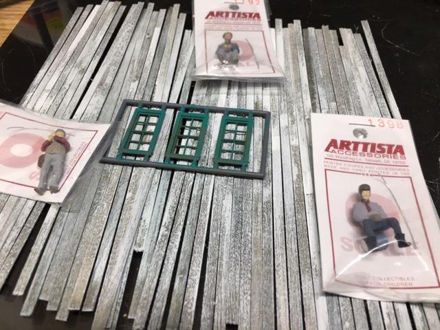 first batch of damp brushed boards with fishermen